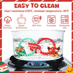 2ooya teether with rattles Christmas edition engages baby during sensory play.