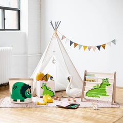 3 Sprouts foldable toy bin in playroom for space-saving organization.