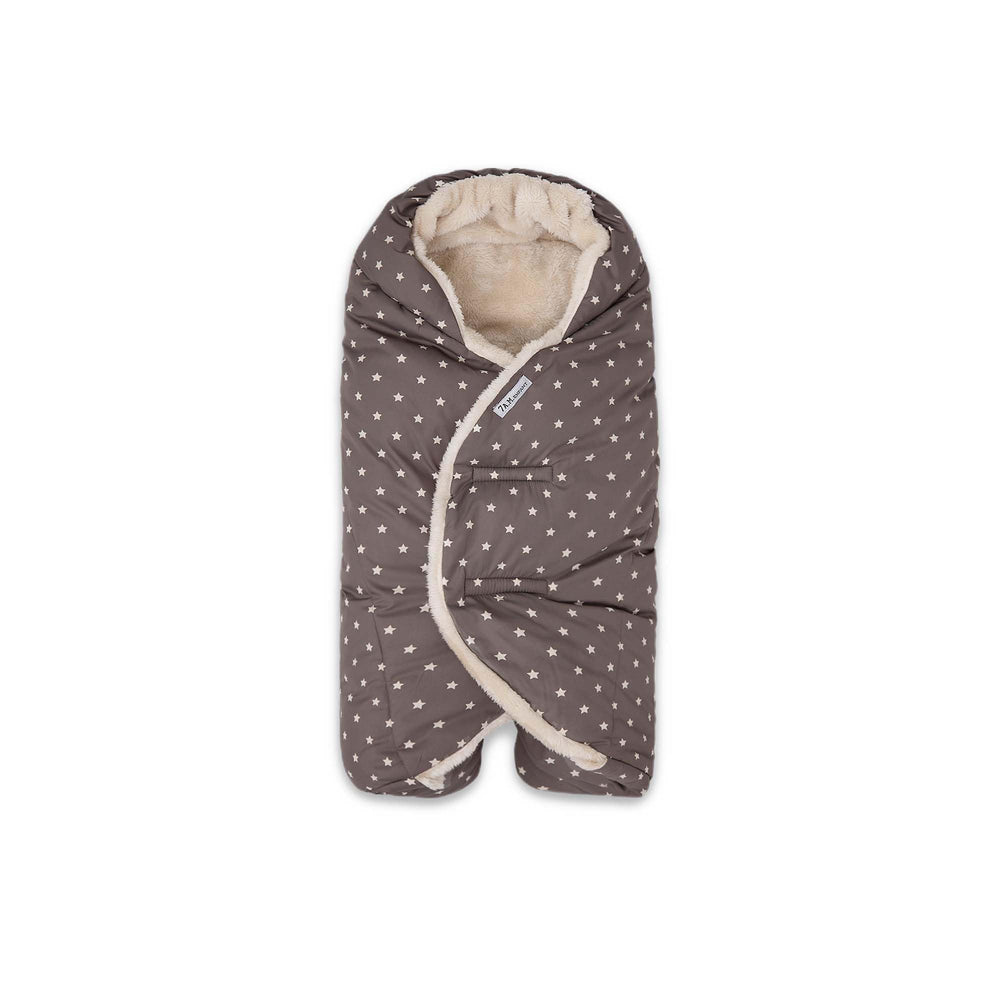 7AM Enfant Nido quilted cover closeup shows soft texture for cozy car-seat warmth.