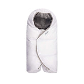 7 A.M. Nido wrap with cozy microfleece lining for warm winter travel comfort.
