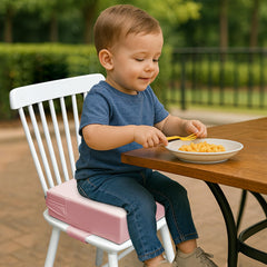 AAAini booster seat pink non-slip base helps keep chairs stable during meals.