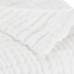 Aablexema muslin baby set demonstrates swaddle-wrap capability with large 43x43 towels.