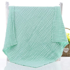 Aablexema swaddle blanket white-green shows a cozy wrap for newborn comfort.