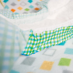 AB Universe Little Pawz green-blue plaid print adds cheerful color.