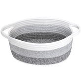 ABenkle small basket with handles on a shelf for nursery organization