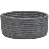 ABenkle small round basket on desk for tidy desk organization.