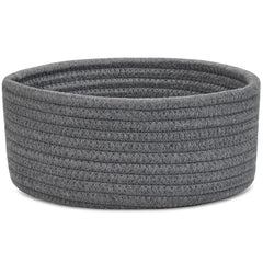 ABenkle small round basket on desk for tidy desk organization.