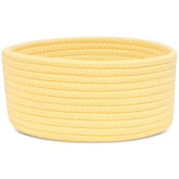 ABenkle small round basket on a desk for easy small-item organization.