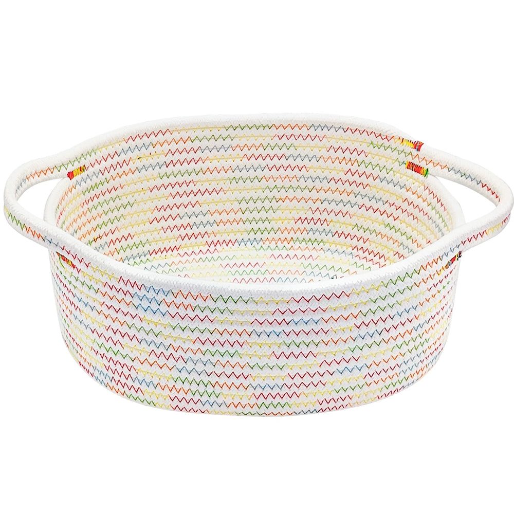 ABenkle small woven basket on shelf keeps toys organized.