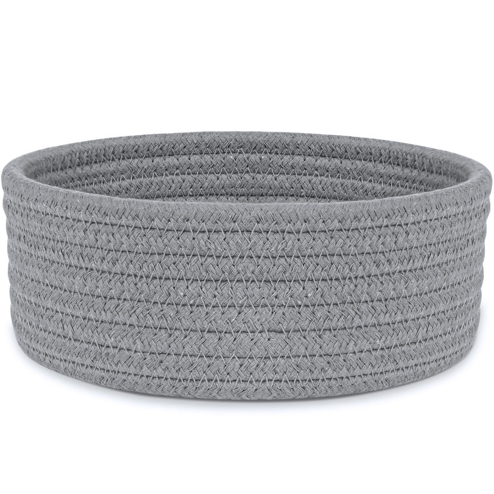 ABenkle small woven basket on desktop setup for tidy desk organization and easy access.