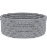 ABenkle small woven basket on desktop setup for tidy desk organization and easy access.