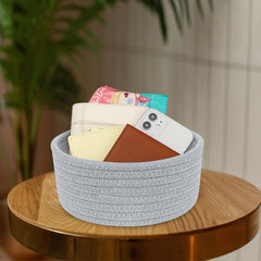 ABenkle small woven basket as nursery decor with soft cotton rope and gentle storage.