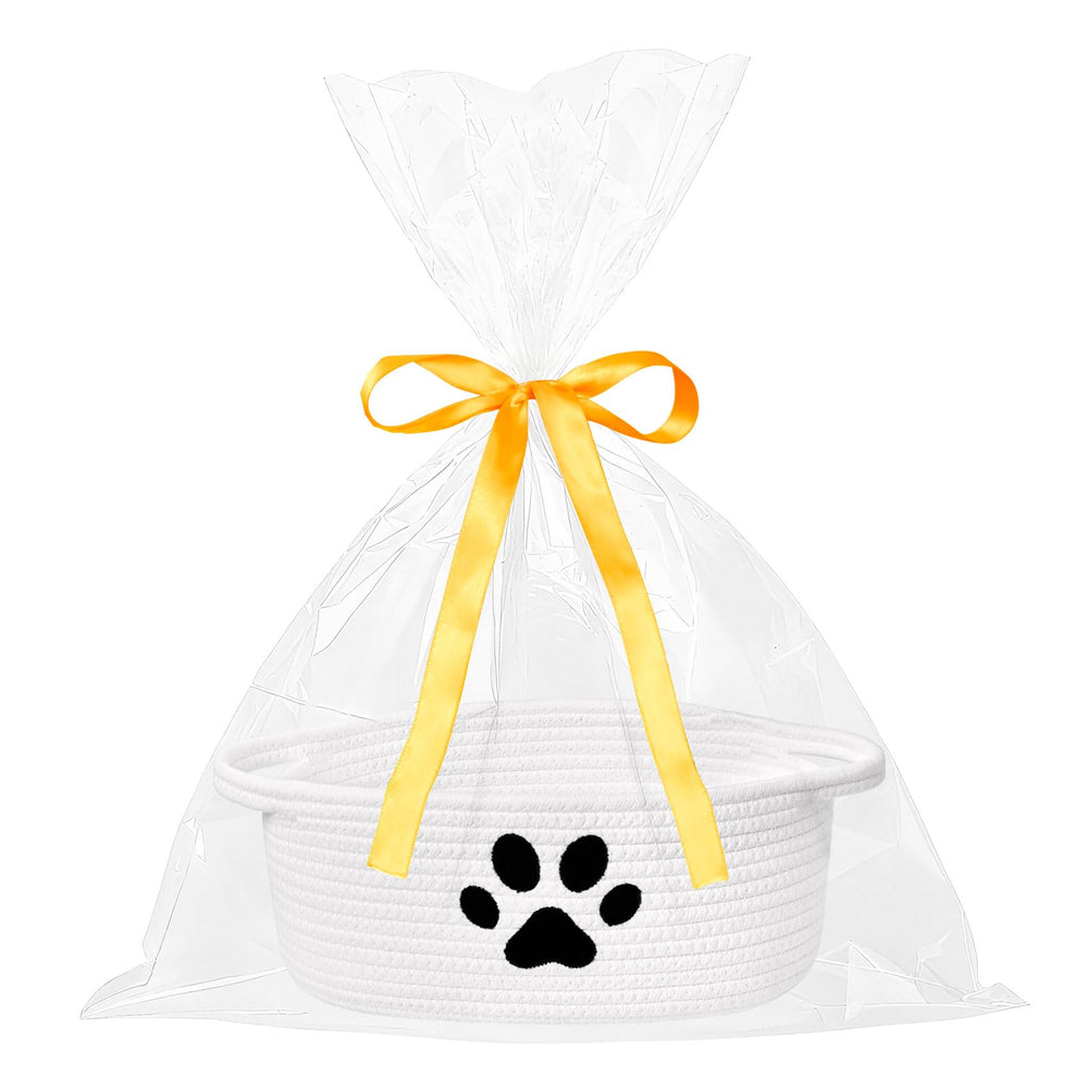 ABenkle small woven basket with paw design, ideal for nursery storage.