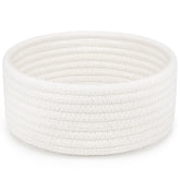 ABenkle small woven basket white side view, ideal for organizing remotes and small essentials.