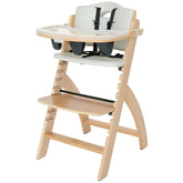 Abiie Beyond Junior high chair tray view for quick, mess-free meals.