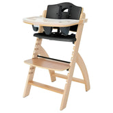 Abiie Beyond Junior high chair height adjustment shows growing child comfort during meals.