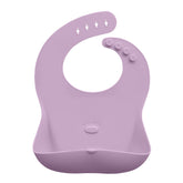 Abiie Ruby Wrapp bib with adjustable snap buttons for growing babies