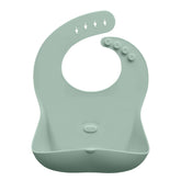 Abiie Ruby Wrapp Sage Green front pocket catch keeps meals tidy.