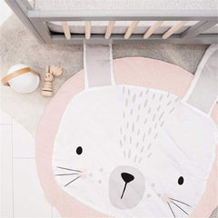 ABREEZE pink cotton rug offers gentle warmth and a safe play area.
