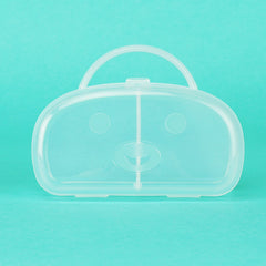 Accmor pacifier case interior with two pacifiers for compact travel storage.