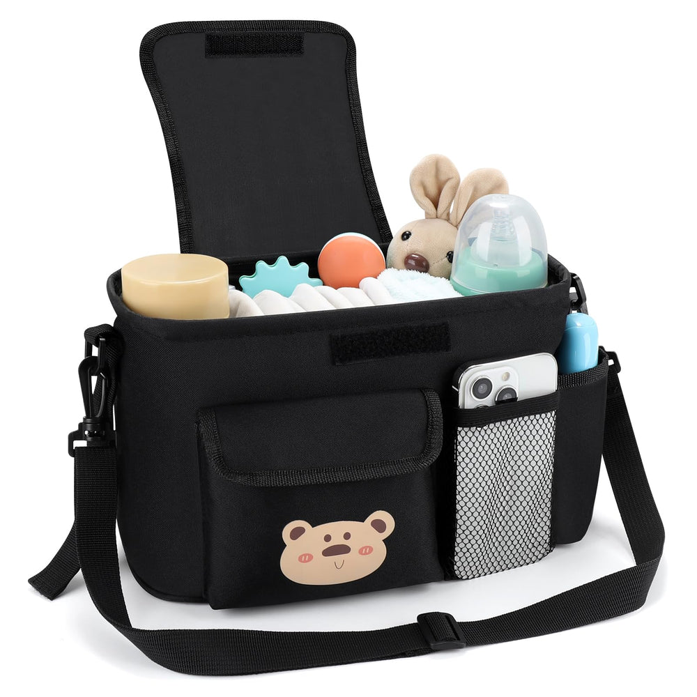 Accmor universal stroller organizer middle compartment stores diapers and cloths.