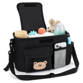 Accmor universal stroller organizer middle compartment stores diapers and cloths.