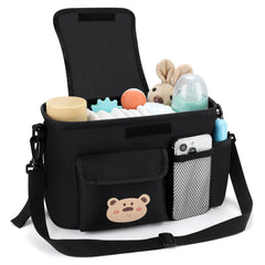 Accmor universal stroller organizer middle compartment stores diapers and cloths.