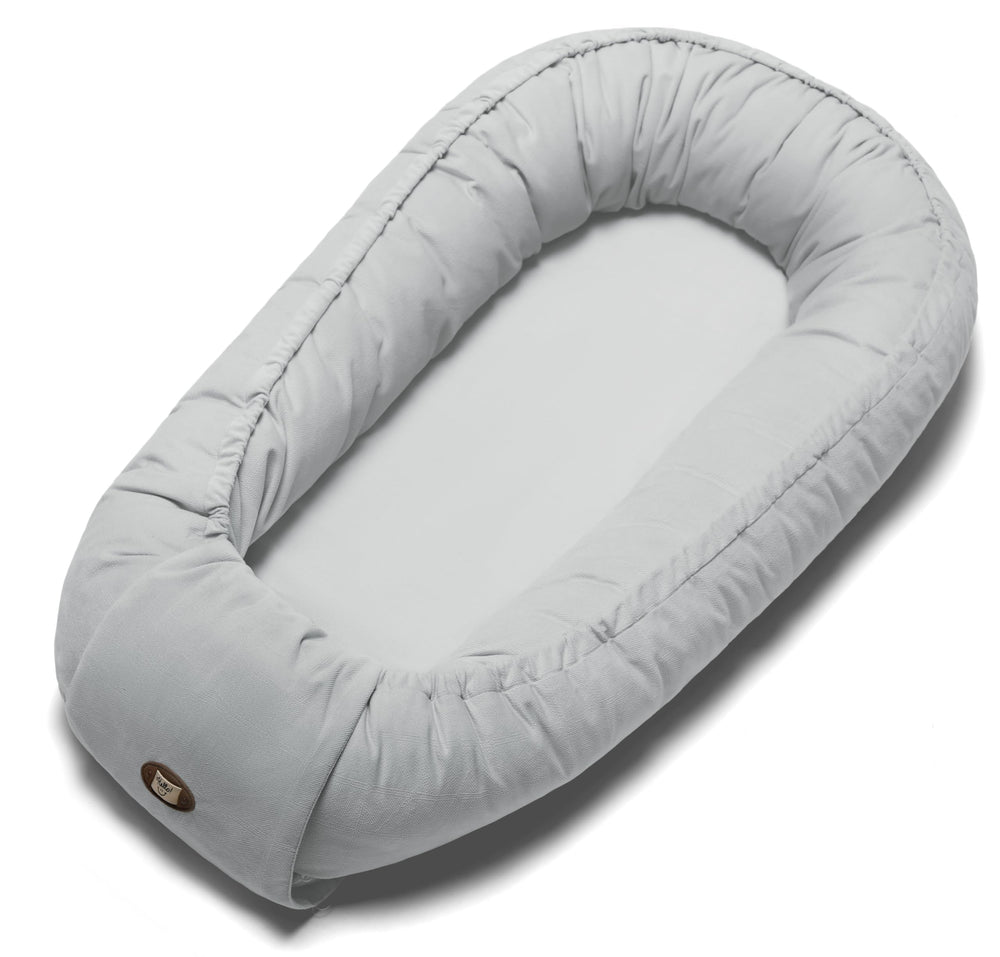 ACIROC Baby Lounger gray cover closeup showing soft fabric and safe padding for newborns.
