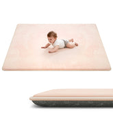 ACOMOPACK play mat during tummy time offering cushioned support for tiny knees.