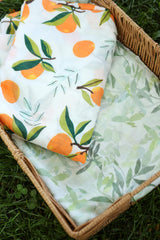 A&D Select Co Forest Leaf swaddle close-up fabric showing soft organic fibers for cozy naps