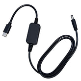 Adabuli baby camera USB-C adapter in car powering on-the-go video monitoring.