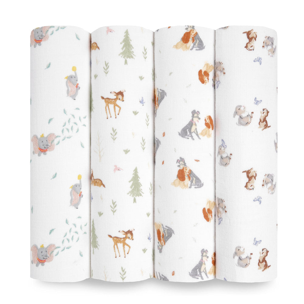 aden + anais Disney baby muslin swaddle blanket used for cozy swaddling with breathable cotton.