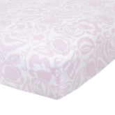 aden + anais Essentials Classic Crib Sheet folded, showing soft muslin and snug fit for baby sleep
