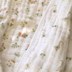 aden + anais Essentials Dream Blanket arranged in nursery crib setup for cozy naps