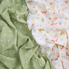 aden + anais Essentials muslin swaddle Sage Woodland laid flat for lightweight, soft newborn comfort.