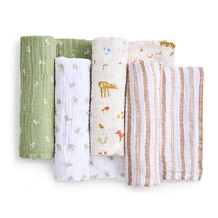 aden + anais essentials muslin swaddle soft fabric close-up highlights versatile 44x44 multi-use blanket.