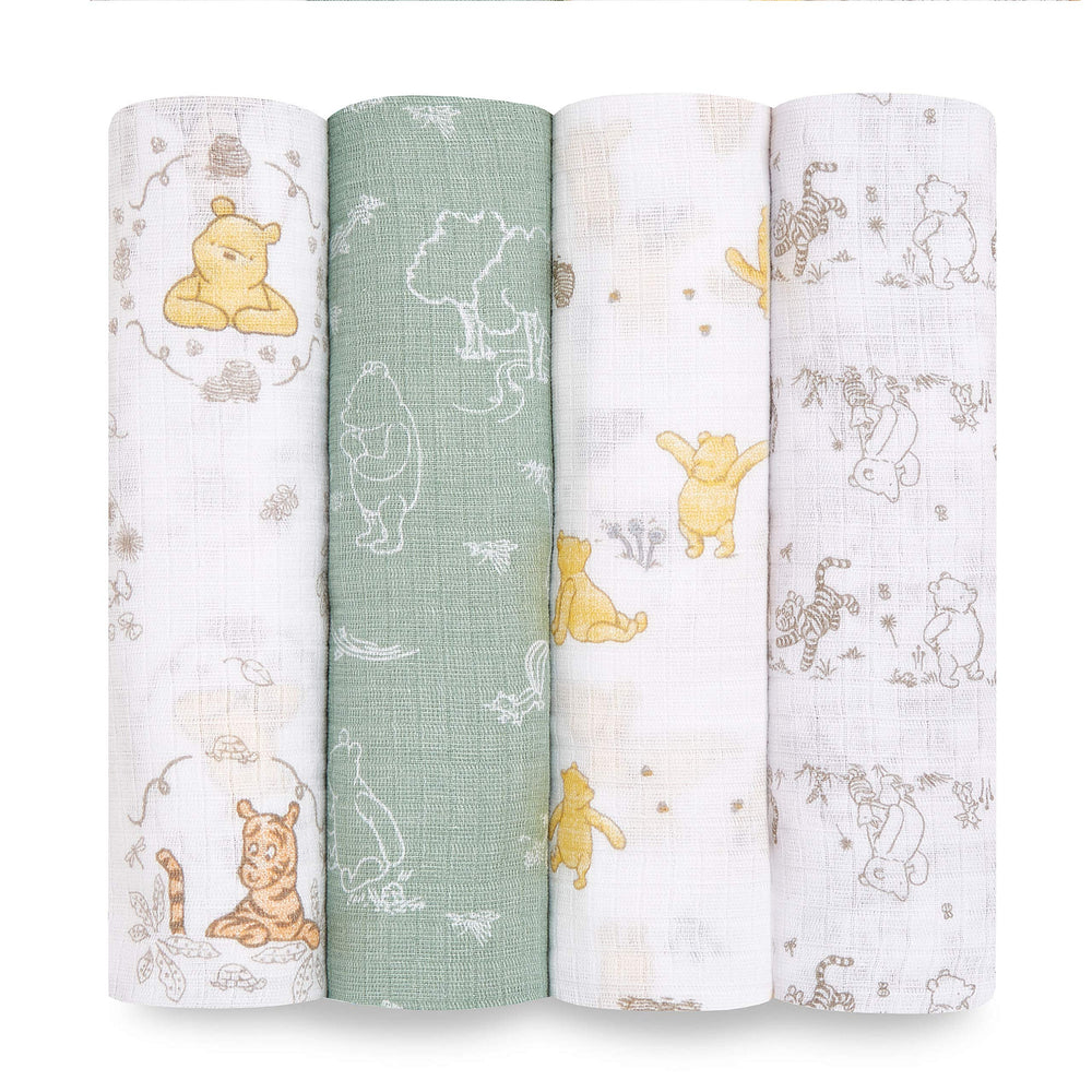 aden + anais Winnie + Friends swaddle blanket laid flat for cozy newborn comfort and versatility