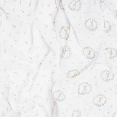 aden + anais Blushing Bunnies muslin swaddle blanket delivers breathable comfort on outings.