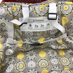 AGANS Infantmania cart cover showing front and back safety belts for extra security.
