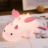 AGV Cici cute baby dragon night light pink on bedside improves bedtime ambiance