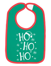 Aiden's Corner green baby holiday bib front view showing festive design and spill protection