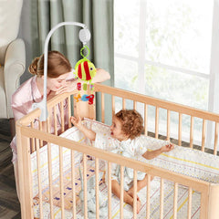 AIFUDA 25-inch baby crib mobile holder rotating music box in action