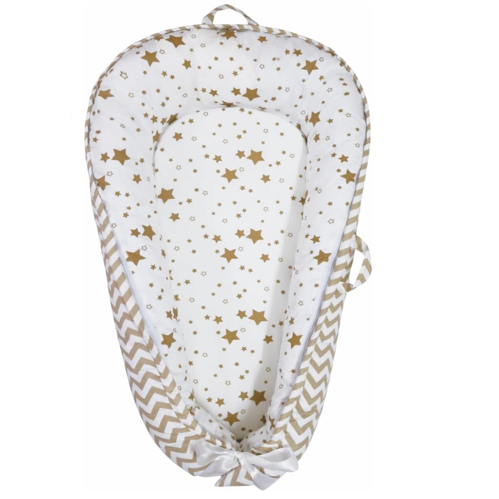 Aila+Aiden Baby Lounger cover close-up reveals soft organic cotton ideal for quick diaper changes.