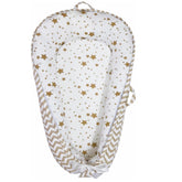 Aila+Aiden Baby Lounger cover close-up reveals soft organic cotton ideal for quick diaper changes.