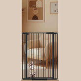 AiWMGL gate closeup shows 1.37-inch spacing for small-pet safety and anti-pinch design.