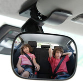 Akexermu baby mirror on visor with wide-angle view for backseat supervision.