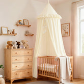 Akiky bed canopy with dreamcatcher and ruffles over crib for cozy privacy.
