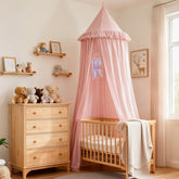 Akiky Kids Bed Canopy with dreamcatcher and ruffles creates a cozy crib sanctuary.