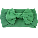 AKOAK green skin-friendly baby headband for gentle daily wear and photos.
