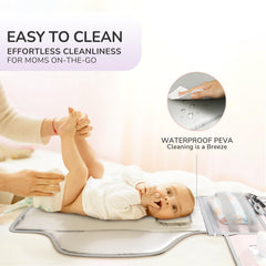 Alatino portable changing pad waterproof surface allows quick cleanup after messes.